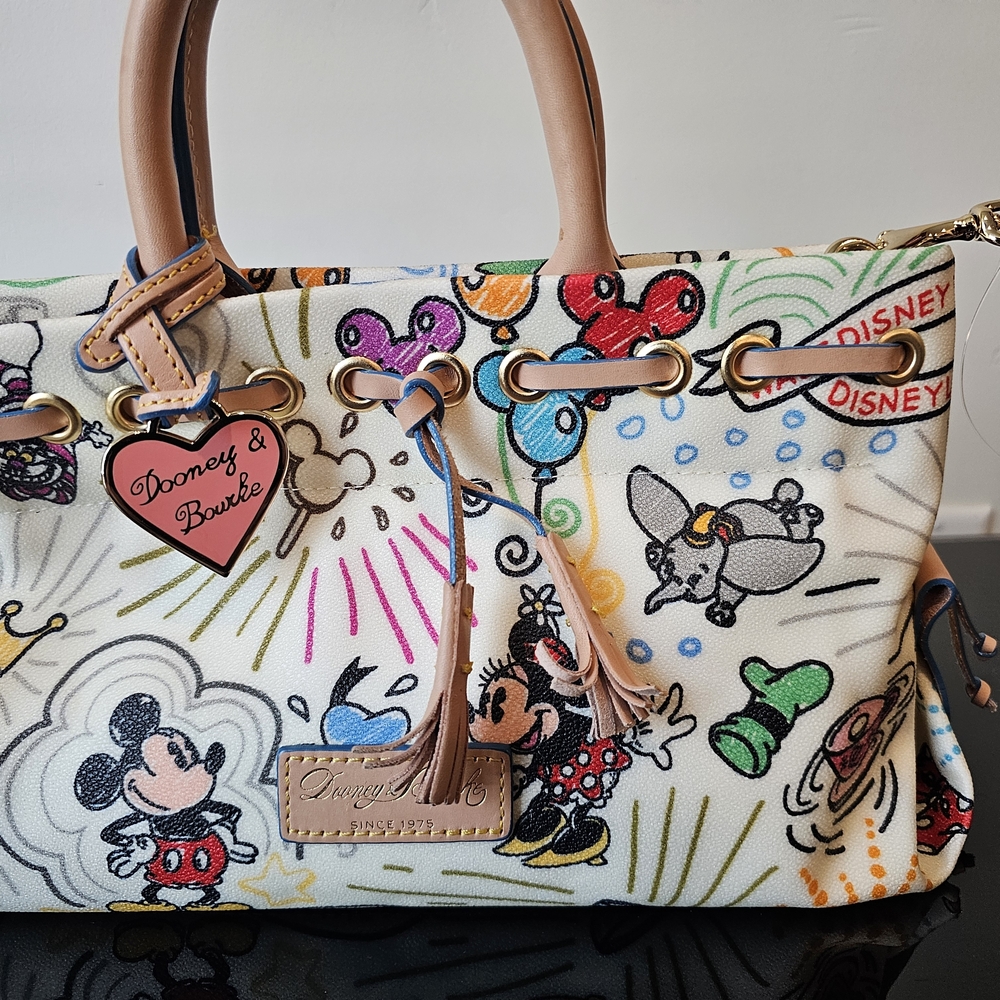 Dooney & Bourke Cream Canvas Disney Print Tote with Tan Leather Trim